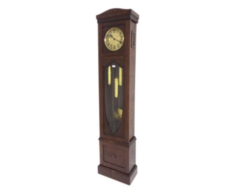 Oak three train longcase clock, the 10" circular brass dial within a glazed and foliate carved case, surmounted by a wavy arc