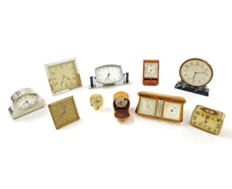 Ten various boudoir and travelling clock timepieces, within metal and leather cases (10)