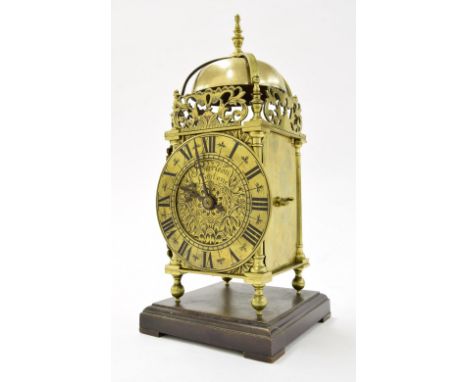 Small brass two train lantern clock, signed Courleon, Lontone to the foliate engraved centre, the carriage clock type movemen