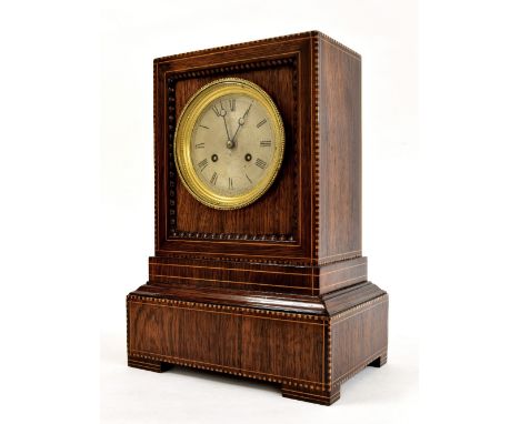 French rosewood two train mantel clock, the movement with outside countwheel striking on a bell, the 4" silvered dial within 