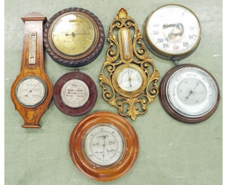 Dutch circular wall barometer, the 8" brass dial inscribed Veranderlijk, Regen Moolweer, within a carved oak rope twist surro