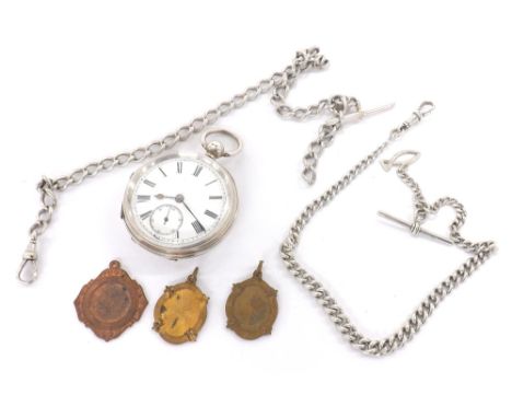 Silver engine turned going barrel lever pocket watch, signed R.M. Brown, Ossett, 52mm; together with two silver curb link wat