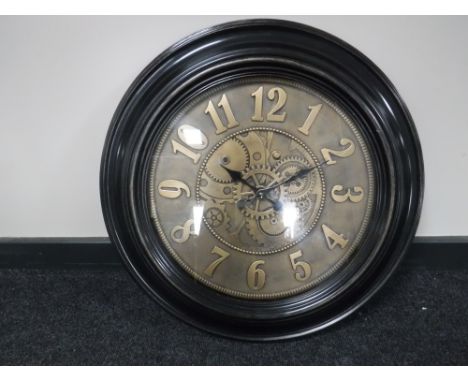 A large contemporary industrial style wall clock