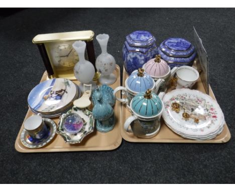 Two trays containing Ringtons castle and cathedral caddies, three Sadler teapots, Royal Worcester millennium cup and saucer, 