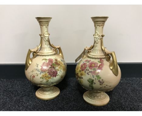 A pair of Royal Worcester hand painted blush ivory vases