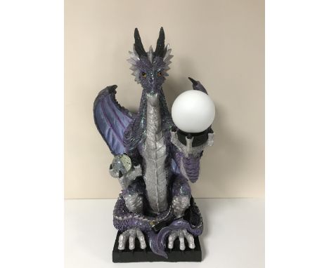 A large contemporary table lamp of a dragon