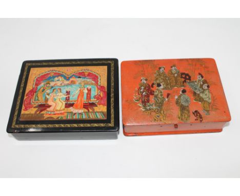 A Russian hand painted and lacquered trinket box, together with another Japanese example. 