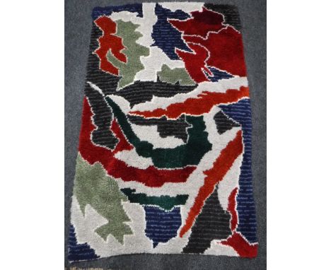 Three 20th century woollen rugs CONDITION REPORT: Good condition. All modern. First rug - 160cm by 102cm. Second - 131cm by 8