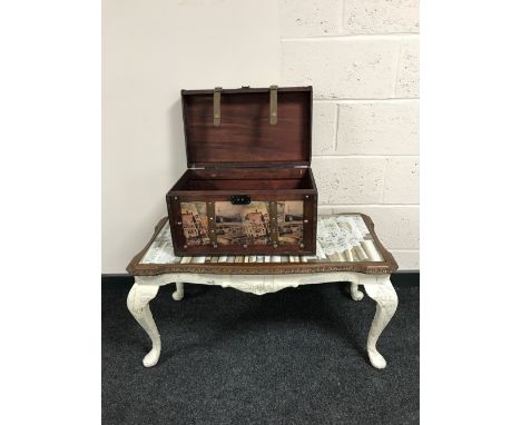 A mahogany Queen Anne style glass topped shabby chic coffee table together with a contemporary leather bound trunk