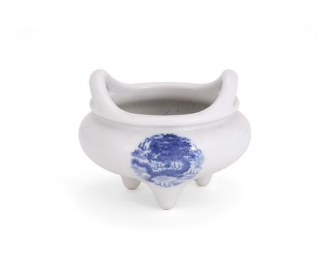 A Chinese blue and white tripod 'dragon' censer, Republic, the bombé body painted with three dragon roundels enclosing a flam