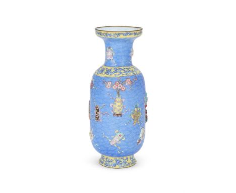 A Chinese canton enamel baluster vase, 18th century, Qing Dynasty, the body moulded in relief with the Eight Buddhist Emblems