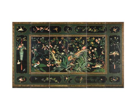 A Chinese Export six-fold screen, Qing dynasty, 19th century, brightly painted on canvas with exotic birds and pendant flower