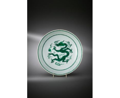 A Chinese green-enamelled 'Dragon' dish, Qianlong seal mark and period, with flaring rounded sides, enamelled at the centre t