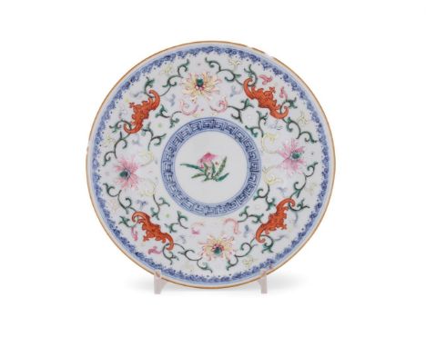 A Chinese Famille Rose 'Bats' plate, Qianlong, enamelled to the interior with a peach branch, surrounded by four bats and lot