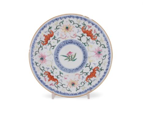 A Chinese Famille Rose 'Bats' plate, Qianlong, enamelled to the interior with a peach branch, surrounded by four bats and lot