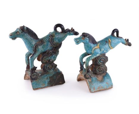 Two Chinese turquoise glazed roof ridge-tiles depicting horses, circa 1600, in the form of flying horses on clouds supported 