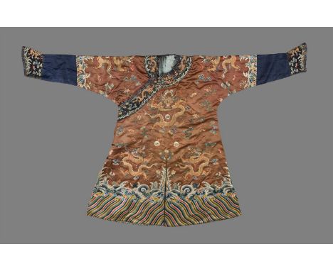 A Chinese chestnut-ground child's embroidered silk 'Nine Dragon Robe', jifu, Qianlong, worked in counted stitch and couched g