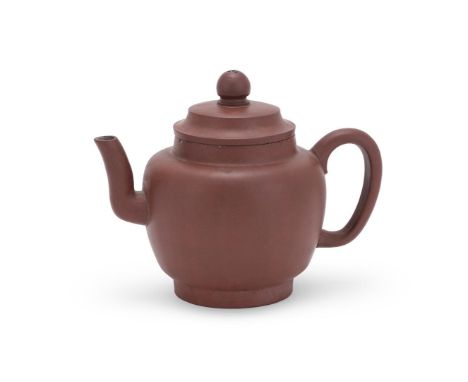 A large Chinese Yixing teapot, Qing Dynasty, well potted with a baluster body rising to straight mouth rim, with a C-shaped h