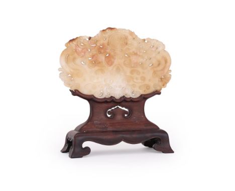 A large Chinese agate plaque, Qing dynasty, 19th century, carved in archaistic style, 22cm wide x 13cm high x 8mm deep, carve