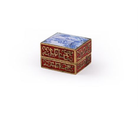 A Chinese canton enamel rectangular box and cover, Qianlong, the cover painted with a landscape scene, the sides modelled in 