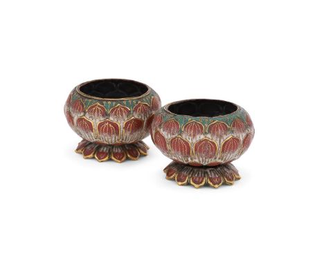 A rare pair of Chinese cloisonné enamel 'Lotus' sections from imperial Buddhist emblems, Qianlong, naturalistically cast as a