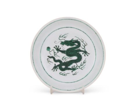 A good Chinese green-enamelled 'Dragon' plate, mark of Kangxi and of the period, nicely enamelled in rich tones of green at t