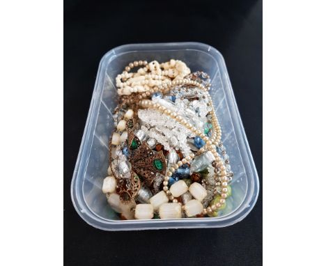 BOX OF VINTAGE NECKLACES AND BEADS