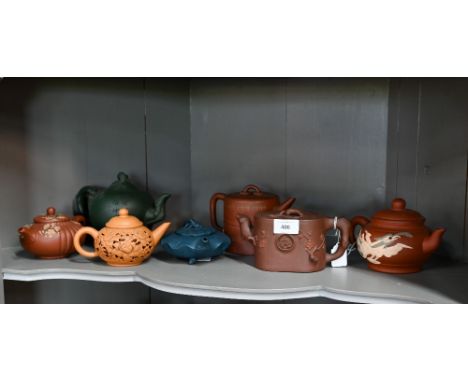 Seven various Chinese Yixing teapots including a 'tree-trunk' example signed 'Rong Ying' and cylindrical example in manner of