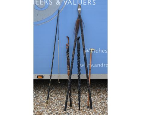 Two Souvenir African spears and two sceptres/canes to/w a driving-whip, hazel, walking stick and walking stick with spirit fl
