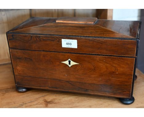 A Regency rosewood sarcophagus tea caddy with bone escutcheon, on bun feet, 33 cm wide 