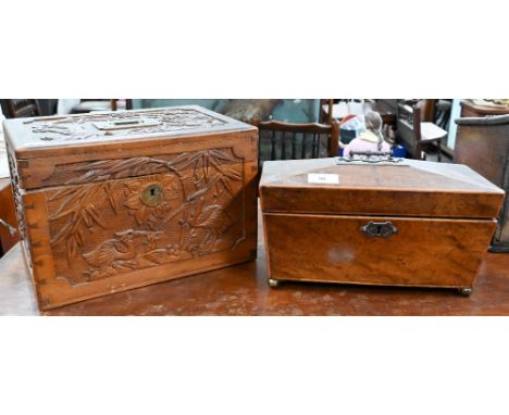 A Regency mahogany sarcophagus tea caddy, fitted twin-compartment interior with glass mixing bowl, brass ball feet and handle