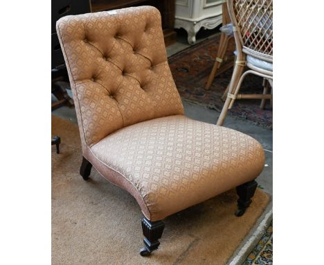 A Victorian button back slipper chair a/f, on castors&nbsp; 