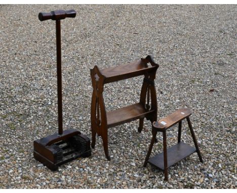 A mahogany and iron bootscrape to/w shoeshiner's foot rest and an Arts &amp; Crafts twin-tier book trough (3) 