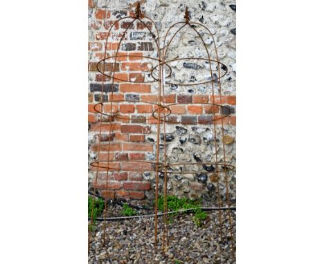 A pair of weathered steel arrow head garden obelisks, approx. 160 cm x 48 cm dia (2) 