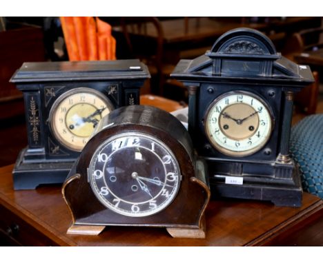 Two late 19th century architectural ebonised mantle clocks to/w a 1930s triple train clock (3) 