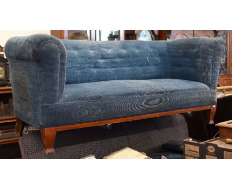 An old Biedermeier style sofa, the walnut framed with blue buttoned upholstery, 184 cm w 76 cm x 76 cm h (38 cm h x 53 cm dee