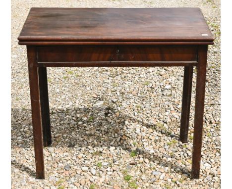A Georgian mahogany folding card table with baise lining and frieze drawer 80 cm x 40 cm x 72 cm h 