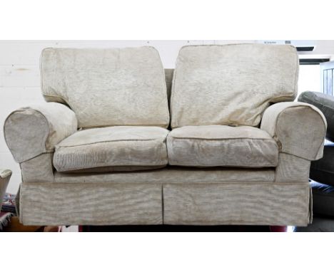 A modern two seated sofa (a/f - missing feet), champagne fabric, 160 x 85 x 90 cm, with Laura Ashley label 