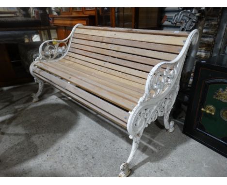     A Cast Iron Scroll Work Garden Bench With Later Wooden Slats 56" Across         