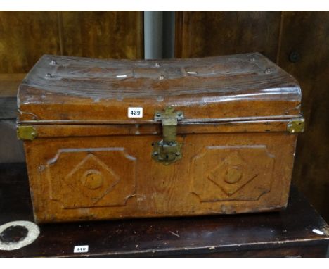     A Vintage Tin Trunk                                                             