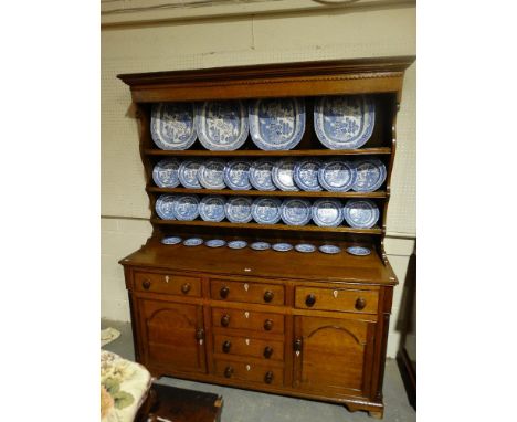     An Antique Oak Welsh Dresser, Having A Three Shelf Rack, The Base With An Arrangement Of Cupboards &amp; Drawers, 69" Wid