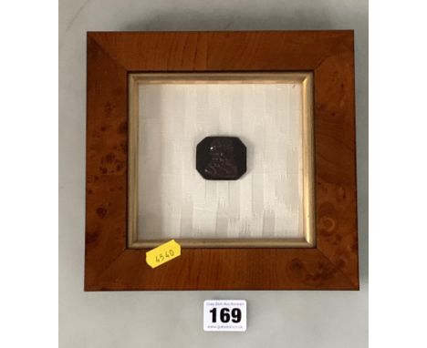 Framed relief portrait plaque of bearded man with hat on black basalt, frame 8" x 7.5"