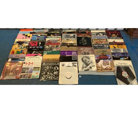 67 assorted LP records inc. The Yardbirds, Jeff Beck, Simple Minds, Jimi Hendrix, The Damned, Talking Heads etc.