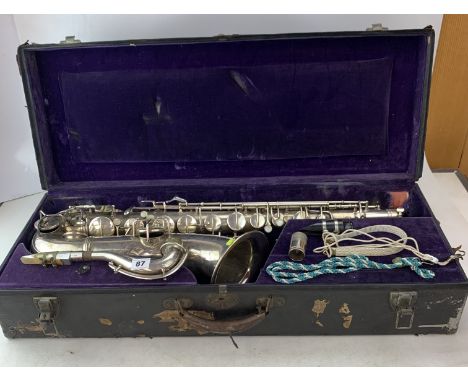 Cased tenor saxophone by G. Conn, Elkhart, Ind. USA with Beryl Larsen, London England mouthpiece and accessories