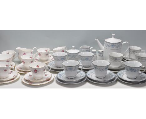 Two vintage retro part tea services to include a Diane blue floral tea service with tea pot together with a Duchess rose chin