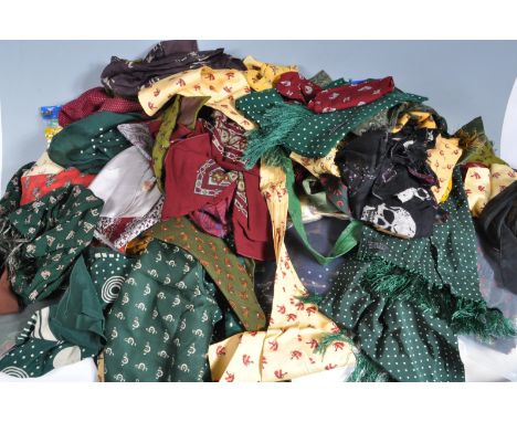 A large collection of vintage 1950s horse riding and equestrian themed men's ties / scarves / cravats having illustrated scen