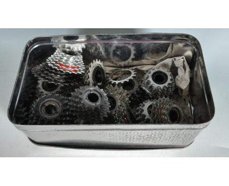 A collection of sixteen vintage 20th century bicycle cassettes by Maillard and more. Measures 12cm wide. Stamped Made in Fran