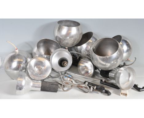 A group of vintage retro 20th century polished aluminium lights to include spherical shade light and conical light shade ligh