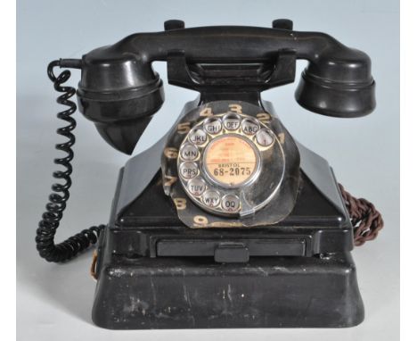 A vintage retro mid 20th century &nbsp;black bakelite pyramid G.P.O. cradle telephone, no 1/232L , complete with type 26 bell