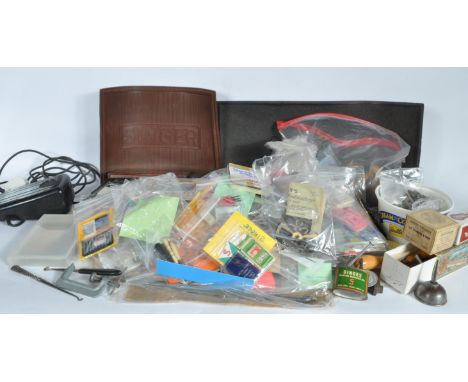 A large collection of vintage 20th century sewing accessories comprising of various tools, hooks, pedal, thimbles, and much m